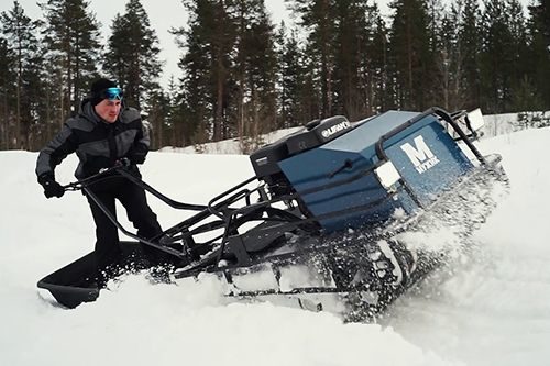 Снимок мужчины на мотособаке Мужик К2 15